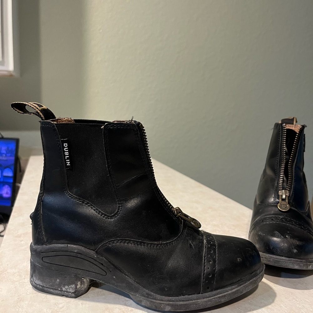 Kids ariat paddock boots.